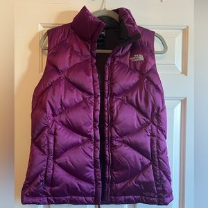 Beautiful North Face  size medium vest in purple. Perfect condition.